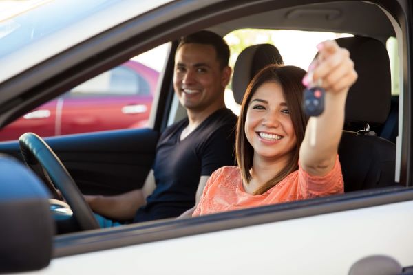 Teen in the car with an instructor